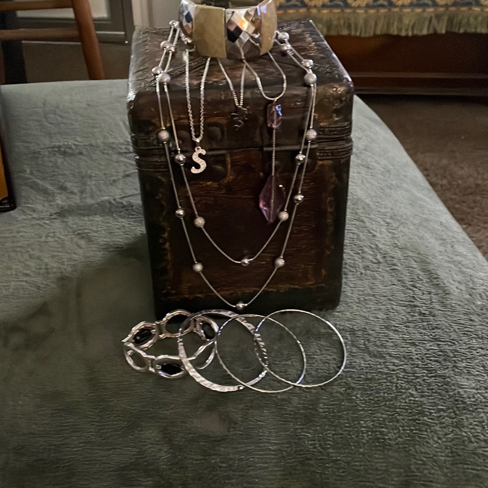 A Bundle of Silver Color Jewelry